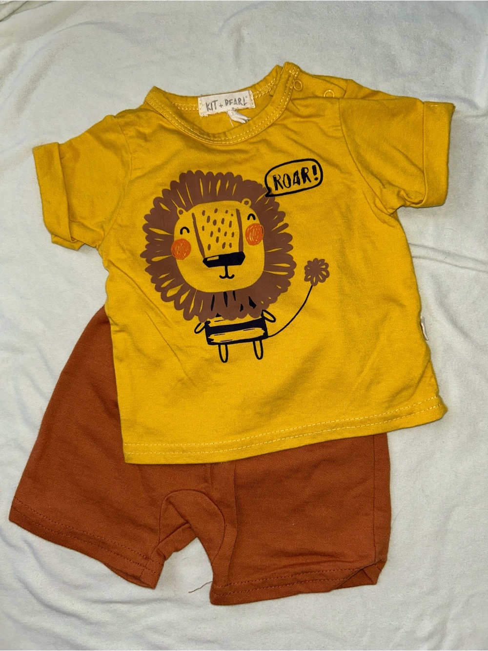 Kit + Pearl Yellow Lion Graphic Baby Tee & Rust Shorts Set